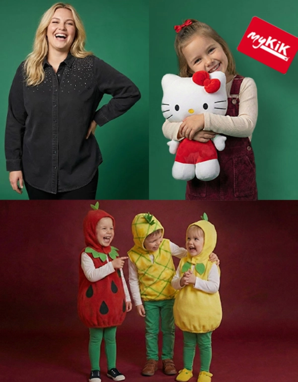 Eine Frau in schwarzem Shirt hält ein Hello Kitty-Plüschtier, während drei Kinder in Obstkostümen vor rotem Hintergrund posieren.