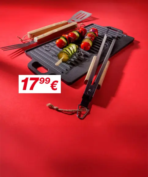 Ein Set aus fünf gusseisernen Kochgeschirrteilen, darunter ein Bräter, eine Pfanne und eine Grillpfanne, vor einem leuchtend roten Hintergrund